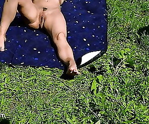 My neighbors039 daughter is tanning naked in the garden